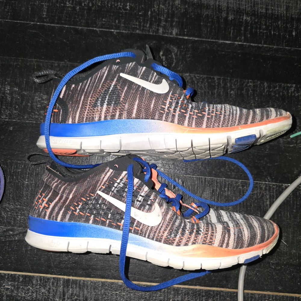 Nike Athletic Shoes with Blue and Orange Accents